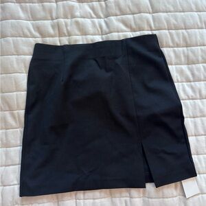 Black mini skirt with slit